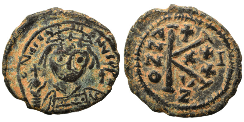 Justinian I, 527-565. Half follis (bronze, 6.17 g, 24 mm), Cyzicus. Helmeted and...