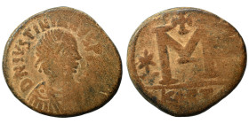 Justinian I, 527-565. Follis (bronze, 18.87 g, 30 mm), Carthage. DN IVSTINIANVS P P AVG Diademed, draped and cuirassed bust right. Rev. Large M; star ...