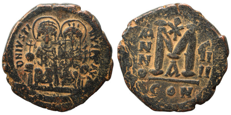 Justin II, with Sophia, 565-578. Follis (bronze, 14.96 g, 31 mm), Constantinople...