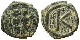 Tiberius II Constantine, with Anastasia. 578-582. Half Follis (bronze, 5.45 g, 21 mm), Thessalonica. Tiberius II and Anastasia seated facing on double...