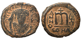 Tiberius II Constantine, 578-582. Follis (bronze, 11.98 g, 29 mm). Constantinople. Crowned bust facing, wearing consular robes, holding mappa and scep...