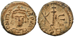 Maurice Tiberius. 582-602. Decanummium (bronze, 1.95 g, 15 mm). Constantinople, struck 582/3. Helmeted, draped, and cuirassed bust facing. Rev Large I...