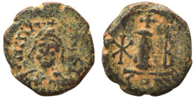 Maurice Tiberius, 582-602. Decanummium (bronze, 3.07 g, 16 mm), Constantinople. Helmeted, draped, and cuirassed bust facing. Rev. Large I between star...