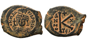 Maurice Tiberius, 582-602. Half Follis (bronze, 8.18 g, 26 mm). Thessalonica. D N mAVRC PP AVG helmeted and cuirassed facing bust, holding globus cruc...