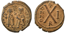 Phocas, with Leontia. 602-610. Decanummium (bronze, 2.37 g, 16 mm), Antioch. Phocas and Leontia standing facing, holding globus cruciger and cruciform...