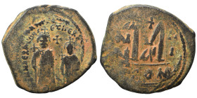 Heraclius, with Heraclius Constantine. 610-641. Follis (bronze, 10.56 g, 31 mm), Constantinople. Heraclius and Heraclius Constantine standing facing, ...