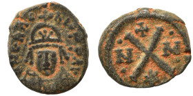 Heraclius, 610-641. Dekanummium (bronze, 3.07 g, 15 mm), Carthage. D N ЄRACLIO P P AVS Helmeted, draped and cuirassed bust of Heraclius facing. Rev. L...