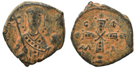 Alexius I Comnenus, 1081-1118. Tetarteron (bronze, 3.78 g, 19 mm), Constantinople. Nimbate bust of emperor facing. Rev. Jeweled cross with C-Φ / M-Δ. ...