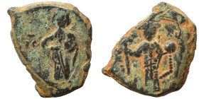 John II Comnenus, 1118-1143. Tetarteron (bronze, 6.29 g, 22 mm), Constantinople. Christ standing facing on footstool, nimbate, wearing pallium and col...