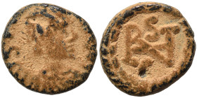 OSTROGOTHS. Athalaric, 526-534. Nummus (bronze, 0.95 g, 10 mm), Rome. In the name of Justinian I. IVSTINIAN Diademed, draped and cuirassed bust right....