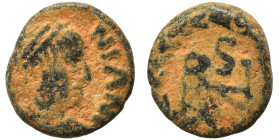 OSTROGOTHS. Athalaric, 526-534. Nummus (bronze, 0.91 g, 10 mm), Rome. In the name of Justinian I. [..]NIAN Diademed, draped and cuirassed bust right. ...