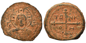CRUSADERS. Principality of Antioch. Tancred, regent, 1101-1112. Follis (bronze, 3.08 g, 21 mm). Nimbate bust of Christ facing, holding book of Gospels...