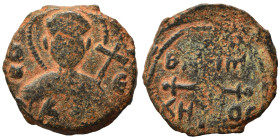 CRUSADERS. Principality of Antioch. Bohémond II, 1112-1130. Follis (bronze, 3.17 g, 20 mm). Nimbate bust of St. Peter facing, wearing tunic, raising h...