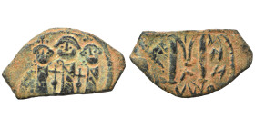 Arab Byzantine. Umayyad Caliphate, circa 640-650. Follis (bronze, 4.36 g, 29 mm), Imitating follis of Heraclius, Uncertain mint in Syria. Three standi...
