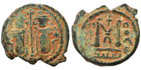 Arab-Byzantine. Umayyad Caliphate, circa 685-705 AD. Fals (bronze, 4.87 g, 21 mm), Baalbek (Heliopolis). Two imperial standing figures, each holding c...