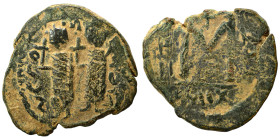 Arab-Byzantine. Circa 1st half of 7th cenutry. Fals (bronze, 8.66 g, 27 mm). Two imperial standing figures, each holding cruciform sceptre. Rev. Large...