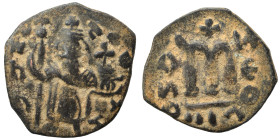 Arab Byzantine. Umayyad Caliphate, circa 641-660 AD. Fals (bronze, 3.27 g, 24 mm). Pseudo-Byzantine type, imitating the types of Constans II. Standing...