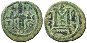 Arab Byzantine. Umayyad Caliphate, circa 641-660 AD. Fals (bronze, 4.60 g, 19 mm). Pseudo-Byzantine type, imitating the types of Constans II. Standing...