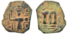 Arab Byzantine. Umayyad Caliphate, circa 641-660 AD. Fals (bronze, 4.37 g, 23 mm). Pseudo-Byzantine type, imitating the types of Constans II. Standing...
