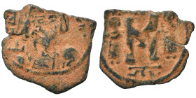 Arab-Byzantine. Umayyad Caliphate. temp. Mu'awiya I ibn Abi Sufyan, AH 41-60 / AD 661-680. Fals (bronze, 1.37 g, 20 mm), Arab-Byzantine, derived from ...