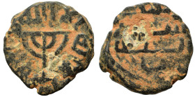 Umayyad Caliphate, circa 695-750. Fals (bronze, 2.71 g, 16 mm), Jerusalem. Menorah, Arabic legend around. Rev. legend in three lines. Cf. Album 163. N...