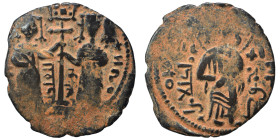 Anatolia & al-Jazira (Post-Seljuk). Zangids (Syria). Fals (bronze, 3.99 g, 25 mm), Halab. Two Imperial figures standing facing, holding between them p...