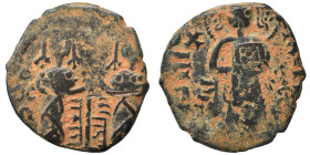 Anatolia & al-Jazira (Post-Seljuk). Zangids (Syria). Fals (bronze, 4.42 g, 23 mm), Halab. Two Imperial figures standing facing, holding between them p...