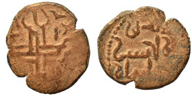 MENKUJAKIDS. Sulayman b. Ishaq, 1181. Fals (bronze, 2.22 g, 19 mm). Islamic legend, citing the Khaqanid ruler Akhsatan I. Rev. Ornamental cross with c...