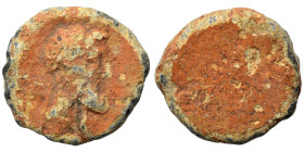 Greek-Roman. Tesserae (lead, 1.67 g, 12 mm). Male head right. Rev. Blank. Fine.