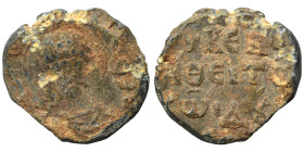 Byzantine seal (lead, 6.54 g, 21 mm). Bust of saint facing. Rev. Legend in three lines. Fine.