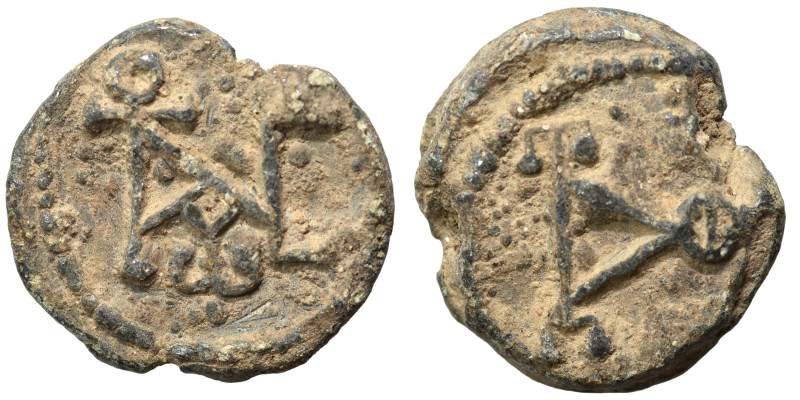 Byzantine seal (lead, 5.94 g, 18 mm). Monogram. Rev. Monogram. Fine.