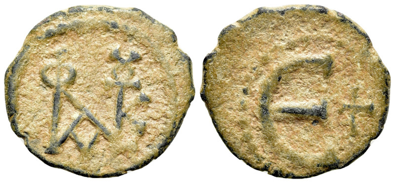 Justin II (565-578). Æ 5 Nummi (16mm, 1.40g, 12h). Constantinople. Monogram. R/ ...