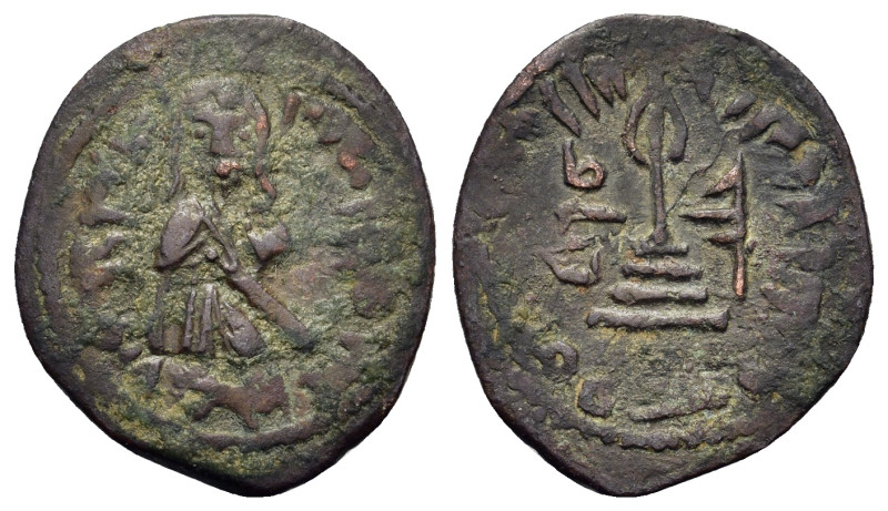 Pre-reform issues, Arab-Byzantine. Standing Caliph coinage. Æ Fals (20,9mm, 3g)....