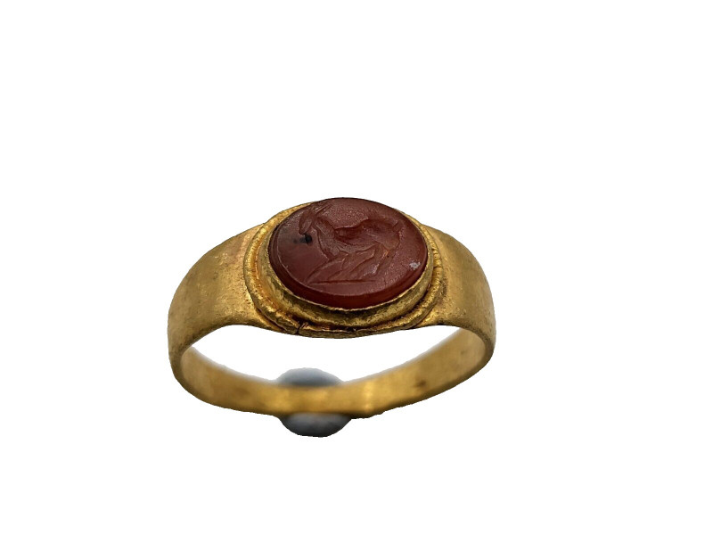Roman Gold Ring with Intaglio 2nd-3rd Century AD
A red cornelian intaglio with ...