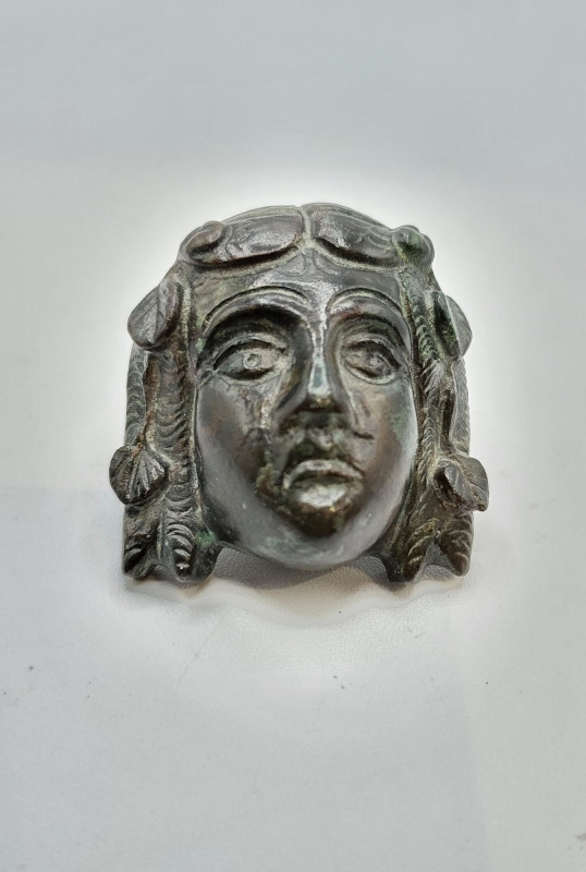 Roman Bronze Theatrical Mask Applique
1st-2nd  Century AD
An Ancient Roman bron...