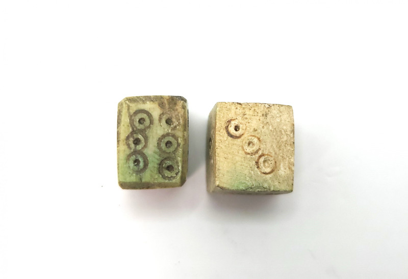 Roman Bone  Dice  
1st - 3rd Century AD
The cube with incised dotted rings on e...