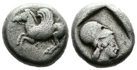 Akarnania, Leukas. Circa 470-450 BC. AR Stater (17 mm, 8.12 g.). Bridled Pegasos with curved wing flying left; below, Λ. Rev. Head of Athena to right,...