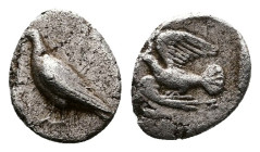 Peloponnesos. Sikyonia, Sikyon.Struck in the 3rd quarte of the 5th. Century BC. AR Hemiobol (8mm, 0.31 g.). Dove walking left with closed wings. Rev. ...