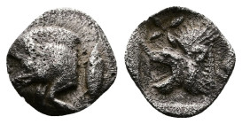 Mysia. Kyzikos. Circa 450-400 BC. AR Hemiobol (9mm, 0.35g.). Forepart of boar left; to right, tunny upward. Rev. Head of roaring lion left; star to up...