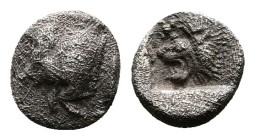 Mysia. Kyzikos. Circa 450-400 BC. AR Tetartemorion (6mm, 0.22 g.). Forepart of boar left; to right, tunny upward (unvisible on the coin, off centered)...