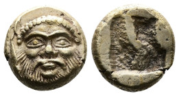 Ionia. Phocaea. 492 BC. Electrum Hecte (11mm, 2.58 g.). Facing head of bearded silenus, small seal swimming downward on left. Rev. Quadripartite incus...