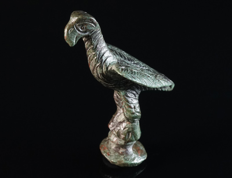 A ROMAN BRONZE FIGURE OF AN EAGLE Circa 2nd-3rd century AD. The bird stands loft...