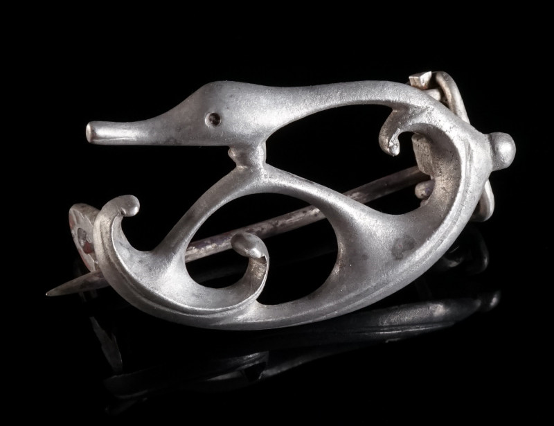 A ROMAN SILVER OPENWORK TRUMPET BROOCH WITH DUCK HEAD Circa 2nd-3rd century AD. ...