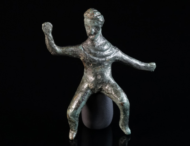 A ROMAN BRONZE STATUETTE OF A THRACIAN HORSEMAN Circa 2nd-3rd century AD. The he...