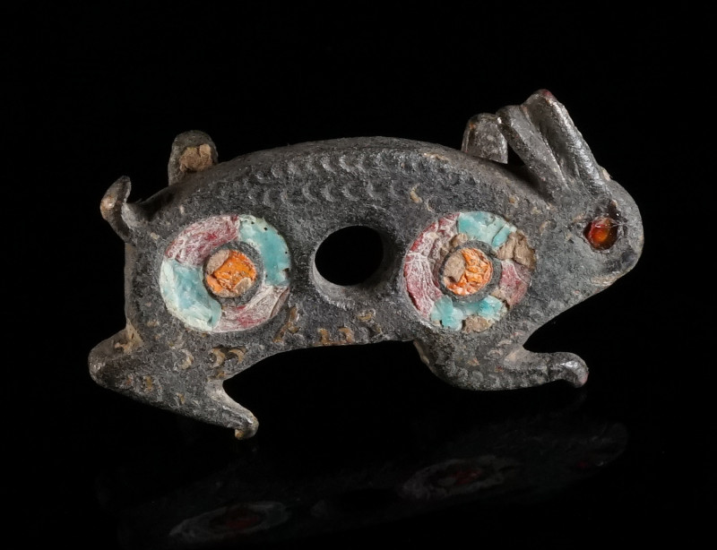 A ROMAN BRONZE BELT FITTING IN THE FORM OF A HARE Circa 2nd century AD. The body...