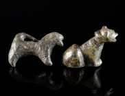 TWO ANCIENT BRONZE ANIMAL FIGURINES Circa 8th century BC - 3rd century AD. A small figurine of a griffin (?), probably Geometric period, with a hole f...