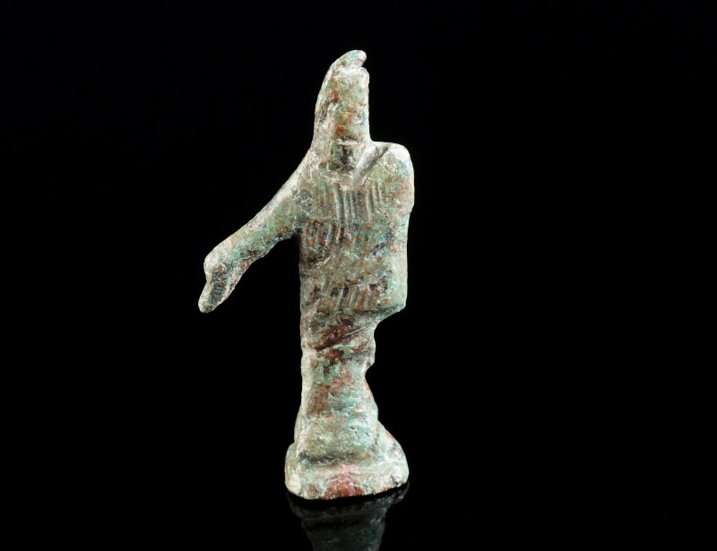 A HIGHLY STYLISED ROMAN BRONZE STATUETTE OF MERCURY Circa 2nd-3rd century AD. Th...