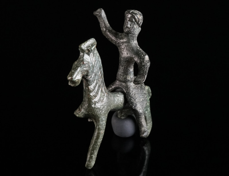 A ROMAN BRONZE STATUETTE OF A THRACIAN HORSE AND RIDER Circa 2nd-3rd century AD....