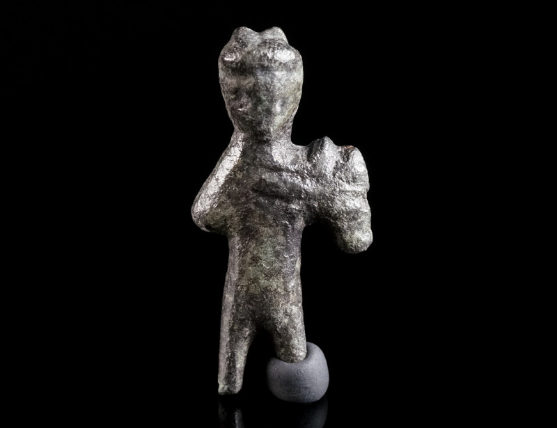 A SMALL ROMAN BRONZE STATUETTE OF MERCURY Circa 2nd-3rd century AD. Stylised rep...