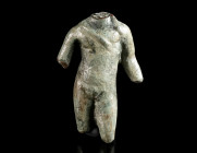 A ROMAN BRONZE TORSO OF APOLLO Circa 1st-3rd century AD. Small bronze statuette, originally depicting the god standing in contrapposto with the weight...